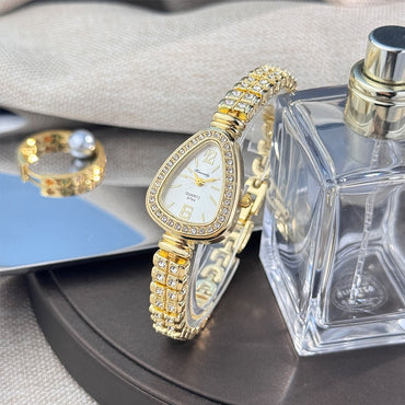 Women's diamond-set snakehead alloy case Sun stripe stripe scale diamond-set fine bracelet quartz watch luxury women's watch