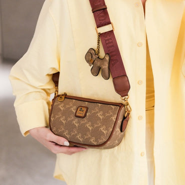 Classic style handbag with strap, featuring a shoulder-sling design, suitable for women, with a bag shape resembling