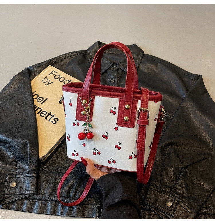 Women PU Cherry Shoulder Bag Large Capacity Trendy Commuting Bag with Cherry Pendant Stylish Crossbody Bag Aesthetic Handbag