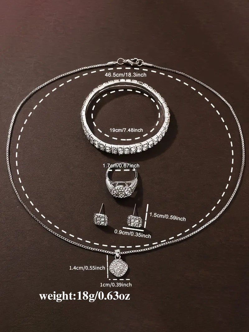 Luxurious ladies' quartz watch and jewelry set with intricate engravings, a birthday gift, and an elegant outfit for a party.