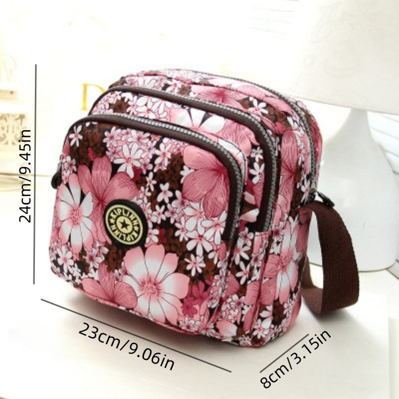 Women's nylon shoulder bag with floral print and multiple compartments, casual crossbody bag