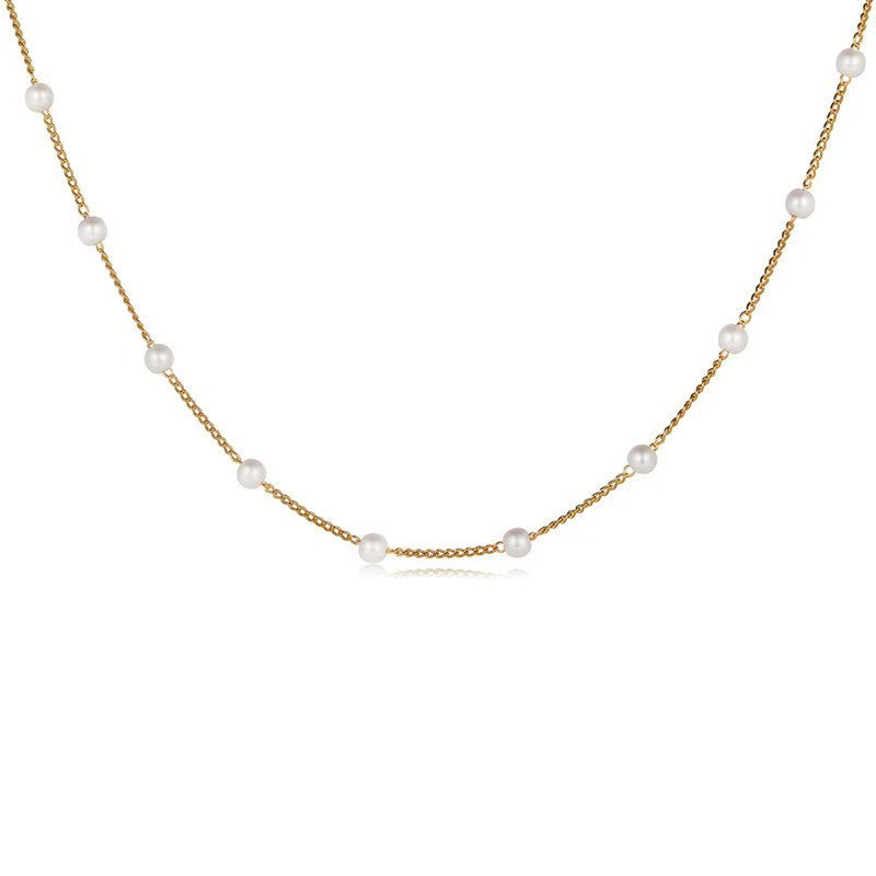 Um colar gargantilha gótico dourado feminino com pingente de pérolas e renda - acessório de joia para meninas
