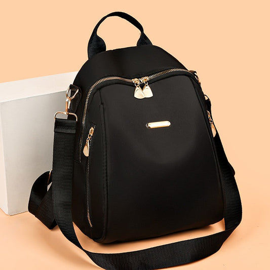 A stylish new women's backpack with a high-end feel, a casual outdoor travel small backpack and a fashionable commuting hand bag