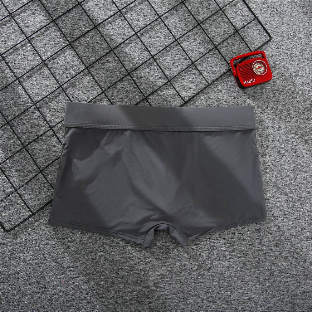 Men's boxer panties, milk silk low rise U convex bag stretch breathable comfortable youth shorts