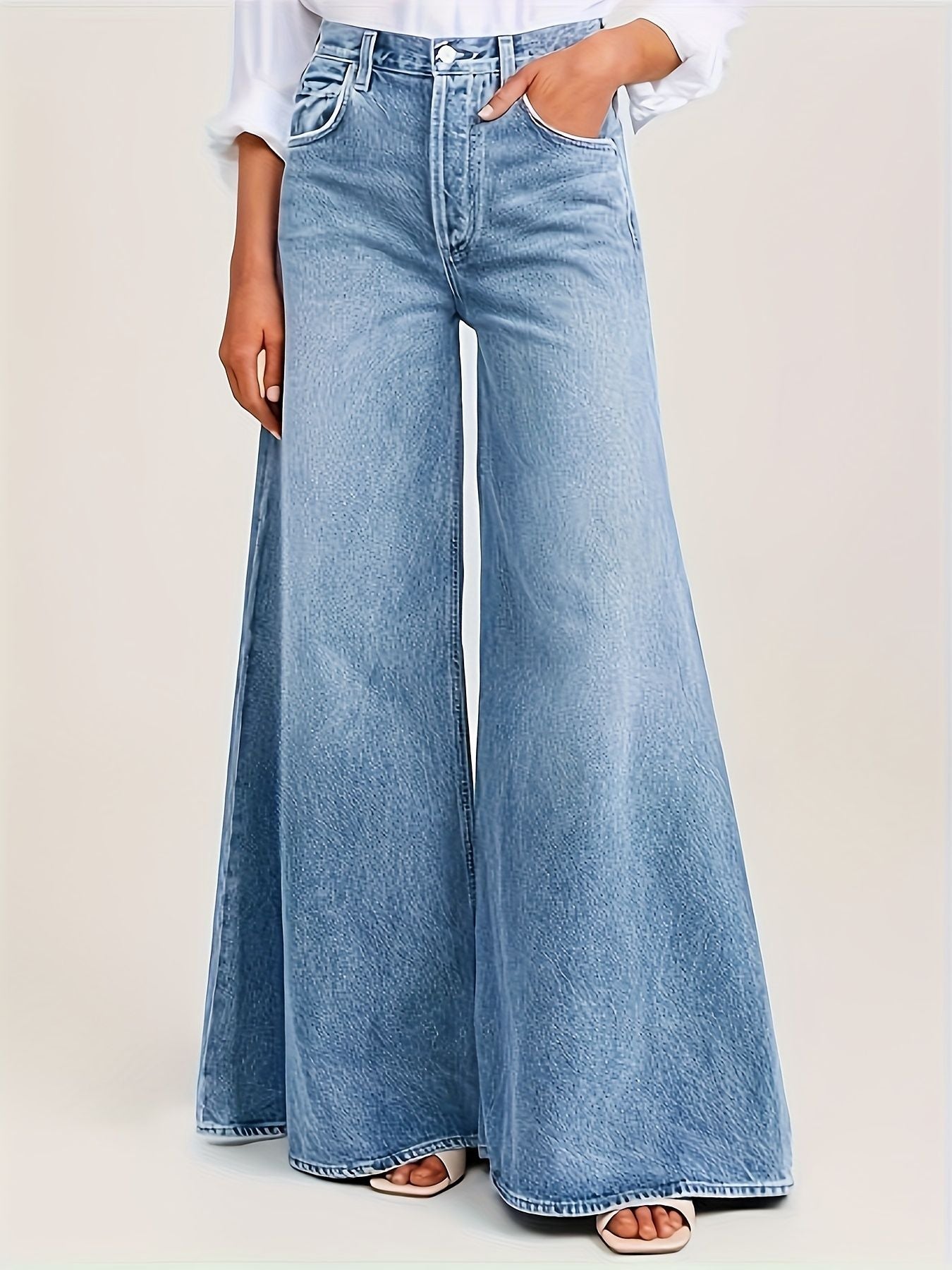 High-waisted light blue faded loose A-line wide-leg women's jeans