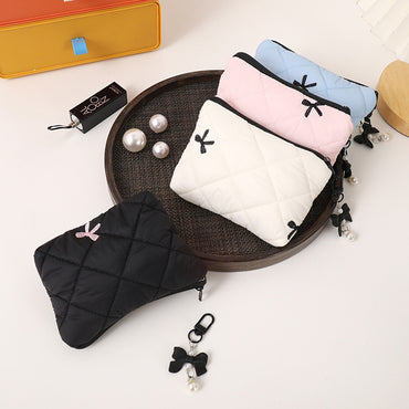 Simple bow quilted clutch, portable everyday small item pouch for lipstick, earphones, and change, soft travel makeup bag