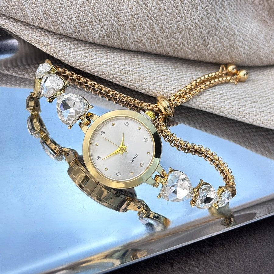 Ladies' quartz watch with three heart-shaped diamond-encrusted bracelet round alloy case and mixed scale simple light luxury