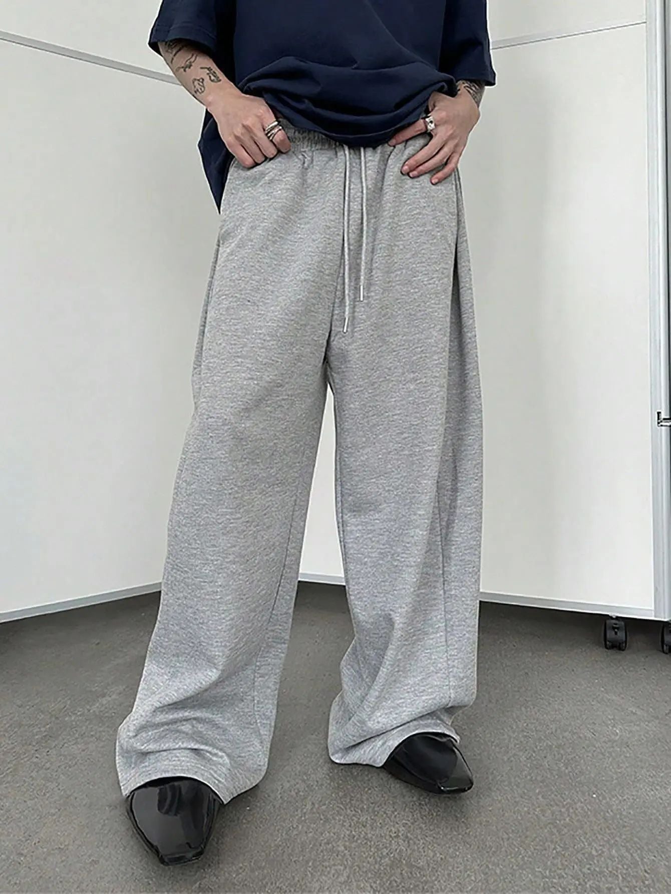 25 European and American men's waist trousers waist drawstring straight wide-leg loose trousers sports trousers pocket men pants