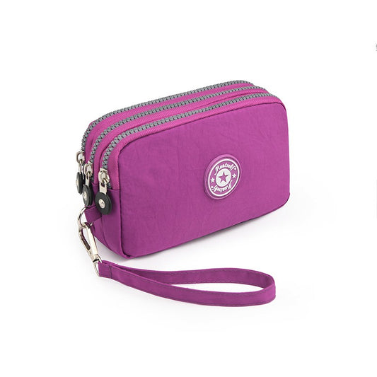 The 3-layer zipper clutch is lightweight, compact and versatile for ladies. It can be used with mobile phones or loose change