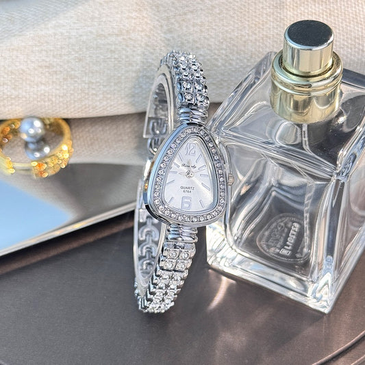 Women's diamond-set snakehead alloy case Sun stripe stripe scale diamond-set fine bracelet quartz watch luxury women's watch