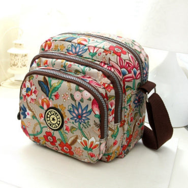 Women's nylon shoulder bag with floral print and multiple compartments, casual crossbody bag