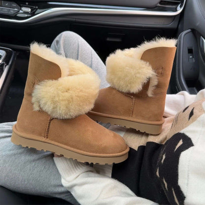 A pair of pure sheepskin and wool winter snow boots for women, warm and comfortable. Simple and fashionable women's shoes