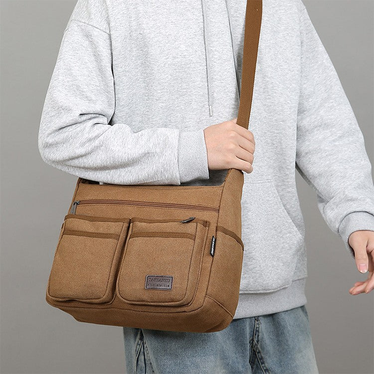 Neutral business casual crossbody bag - adjustable shoulder straps, multiple zippered compartments, durable black polyester lini