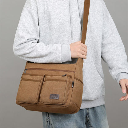 Neutral business casual crossbody bag - adjustable shoulder straps, multiple zippered compartments, durable black polyester lini