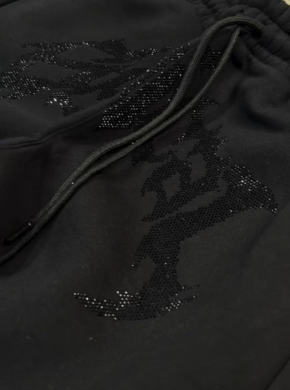 Calça Jogger Y2K Retrô Gótico Hip Hop com Strass Bordado Casual Masculina Feminina Calça Folgada Moda com Tira no Tornozelo