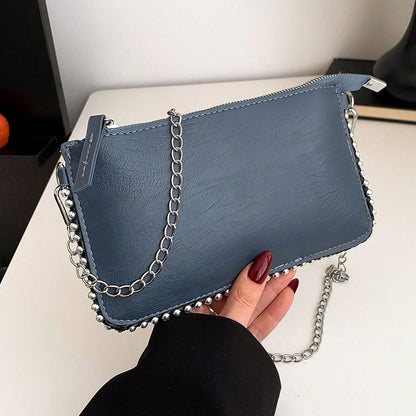 Women's retro classic bead chain design elegant and exquisite crossbody bag solid color commuting envelope bag.