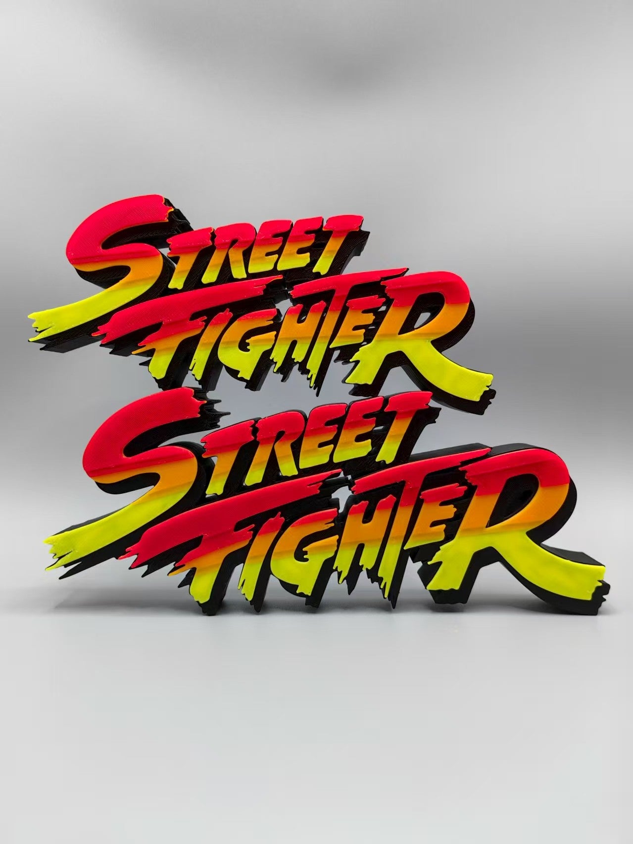 Street Fighter, Street Fighter (abbreviation), arcade game, Street Fighter Logo, signboard, action figure, ornament.