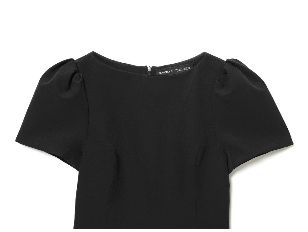 Women's black short puff sleeve mini dress with a stylish boat neckline design and pocket details, suitable for elegant occasion