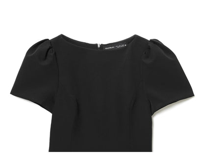 Women's black short puff sleeve mini dress with a stylish boat neckline design and pocket details, suitable for elegant occasion