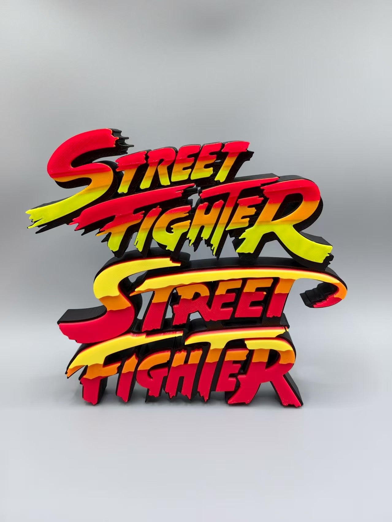 Street Fighter, Street Fighter (abbreviation), arcade game, Street Fighter Logo, signboard, action figure, ornament.
