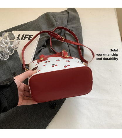 Women PU Cherry Shoulder Bag Large Capacity Trendy Commuting Bag with Cherry Pendant Stylish Crossbody Bag Aesthetic Handbag