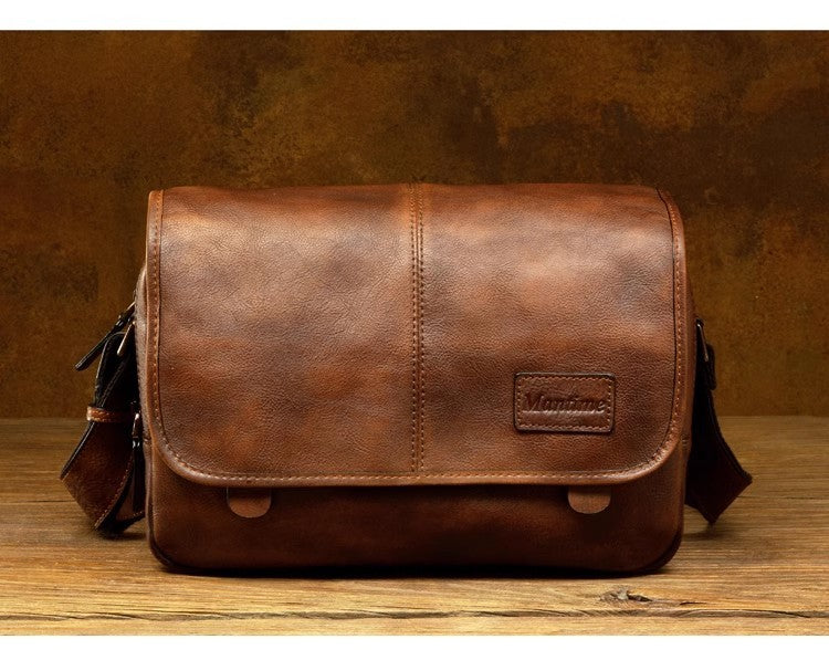 Leather shoulder bag men's messenger bag casual men's bag tide brand high-capacity leather messenger bag tooling backpack.