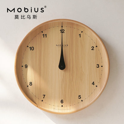 The original wood grain silent and simple wooden wall clock is a fashionable home decoration for the living room clock