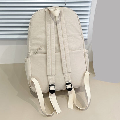 Backpack, large capacity, adjustable shoulder straps, suitable for school, campus travel, and work, with a secure zipper closure