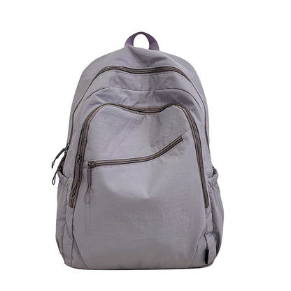 Backpack, large capacity, adjustable shoulder straps, suitable for school, campus travel, and work, with a secure zipper closure