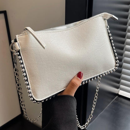 Women's retro classic bead chain design elegant and exquisite crossbody bag solid color commuting envelope bag.