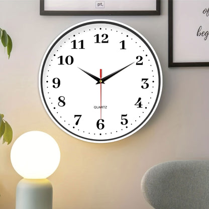 An 8-inch silent wall clock, modern white wall clock with simple design, battery operated quartz clock, adorns the family living