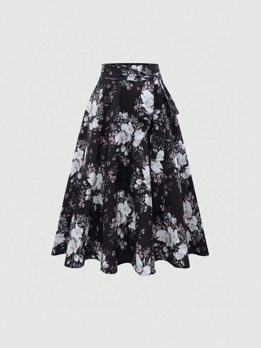 A lady's elegant half skirt with a bow tie and large flowers