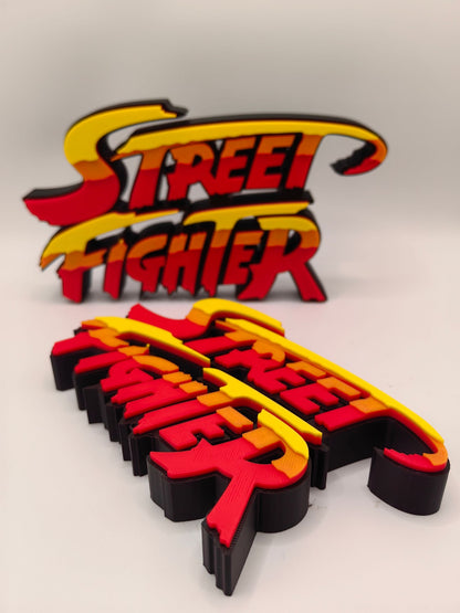 Street Fighter, Street Fighter (abbreviation), arcade game, Street Fighter Logo, signboard, action figure, ornament.