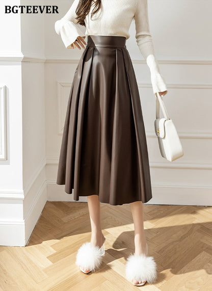 BGTEEVER Spring Autumn Loose PU Leather A-line Skirts Women Elegant High Waist Pleated Faux Leather Skirts Female