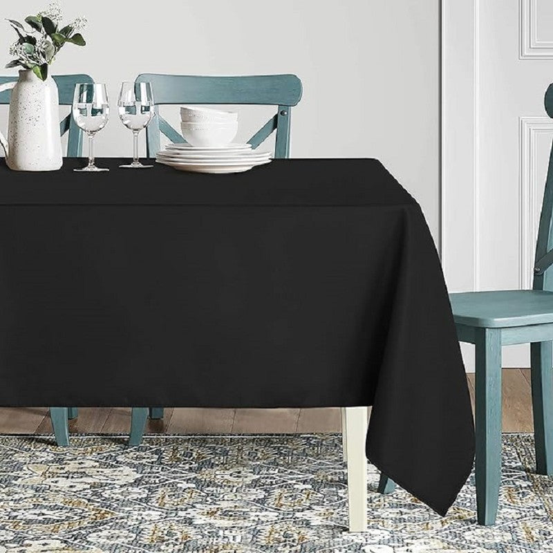 Black Rectangular Tablecloth - 54 x 108 inches - Disposable tablecloths for meals, parties and other occasions.