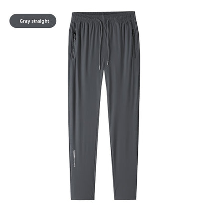 Men's solid color pants summer ice silk elastic quick drying loose sports pants suitable for casual and business wear M-8XL