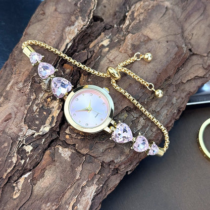 Ladies' quartz watch with three heart-shaped diamond-encrusted bracelet round alloy case and mixed scale simple light luxury