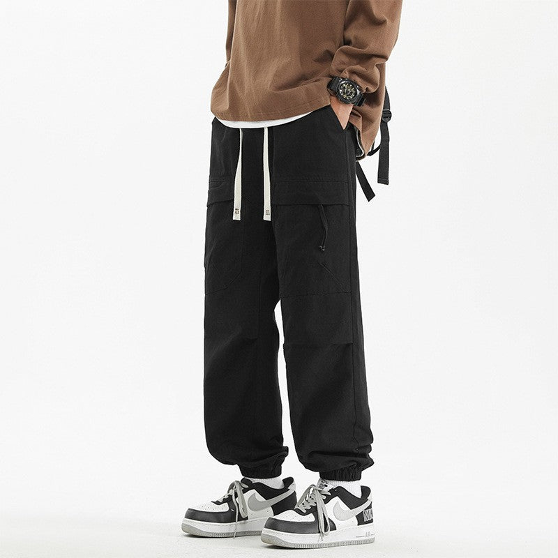 Calça Jogger Solta Multibolsos para Primavera Verão, Calça Casual Masculina Estilo Urbano com Cordão na Cintura, Calça Cargo para Fitness e Atividades ao Ar Livre