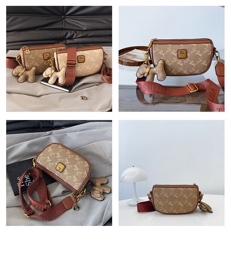 Classic style handbag with strap, featuring a shoulder-sling design, suitable for women, with a bag shape resembling