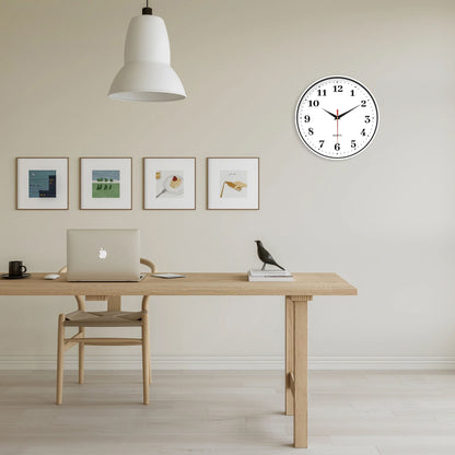An 8-inch silent wall clock, modern white wall clock with simple design, battery operated quartz clock, adorns the family living