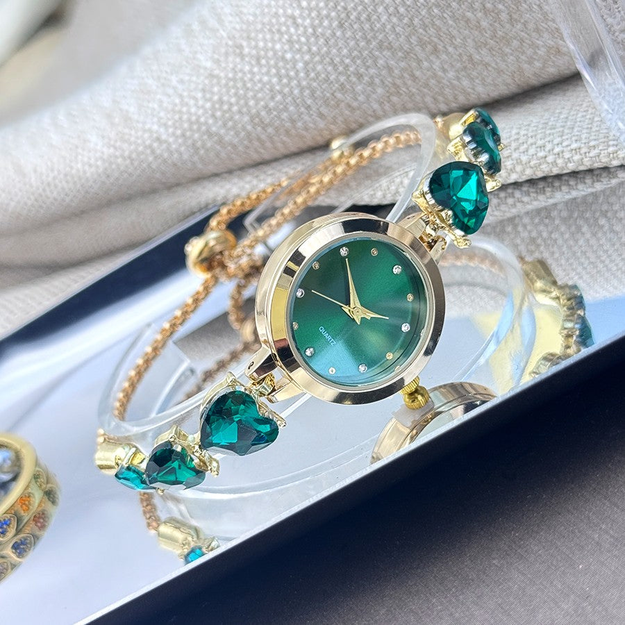 Ladies' quartz watch with three heart-shaped diamond-encrusted bracelet round alloy case and mixed scale simple light luxury