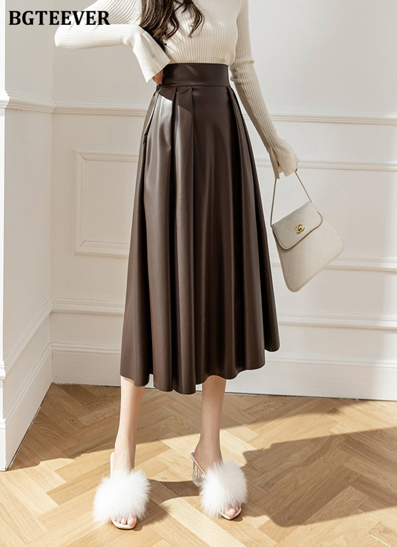 BGTEEVER Spring Autumn Loose PU Leather A-line Skirts Women Elegant High Waist Pleated Faux Leather Skirts Female