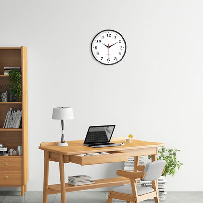 An 8-inch silent wall clock, modern white wall clock with simple design, battery operated quartz clock, adorns the family living