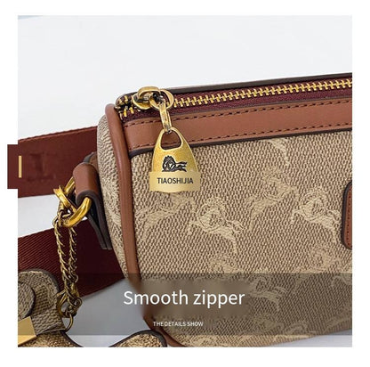 Classic style handbag with strap, featuring a shoulder-sling design, suitable for women, with a bag shape resembling