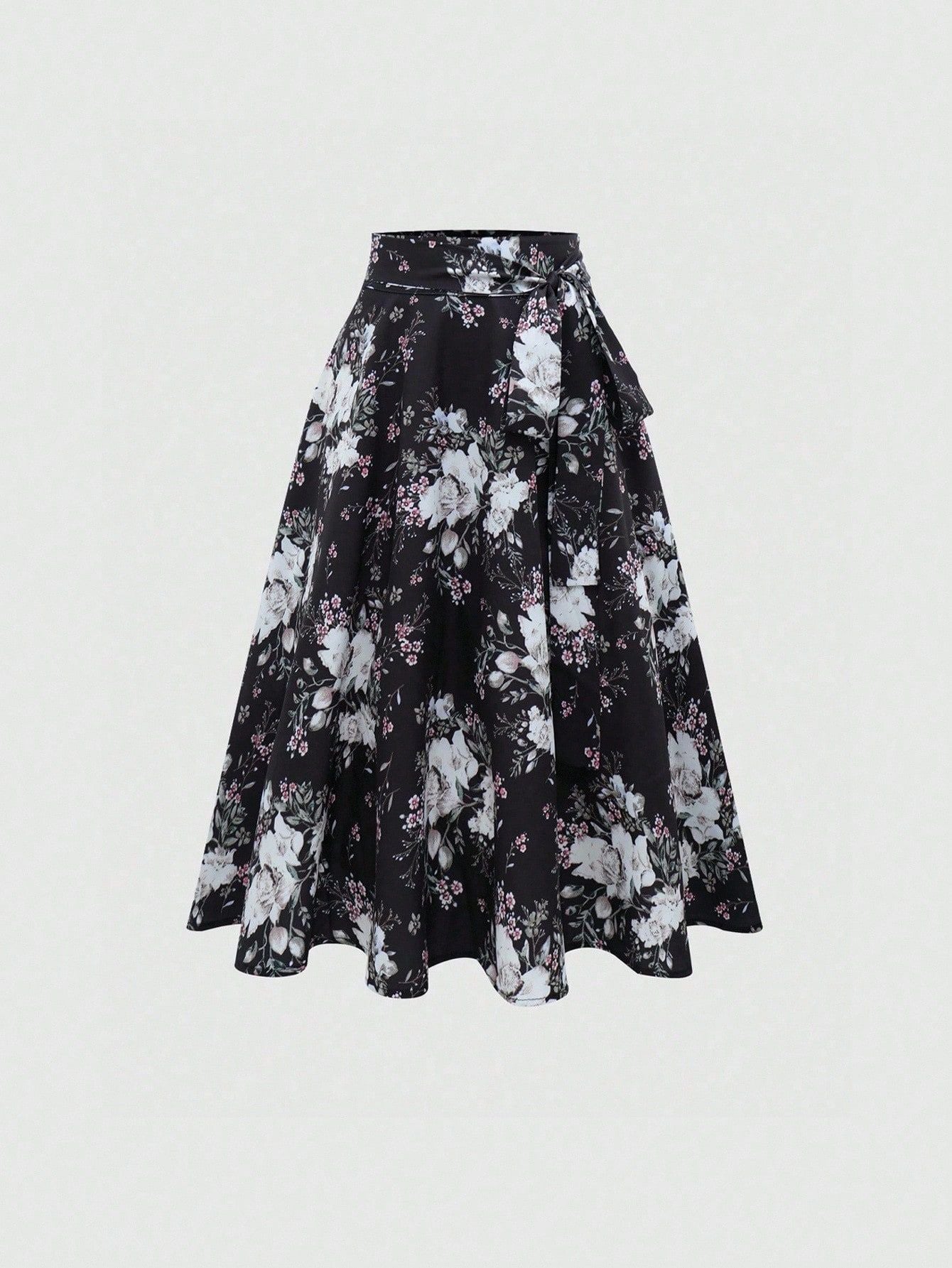 A lady's elegant half skirt with a bow tie and large flowers