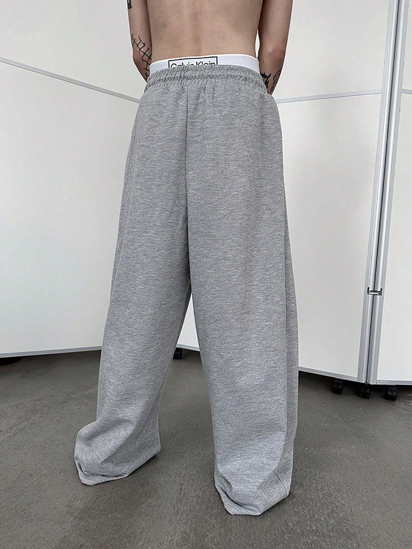 25 European and American men's waist trousers waist drawstring straight wide-leg loose trousers sports trousers pocket men pants