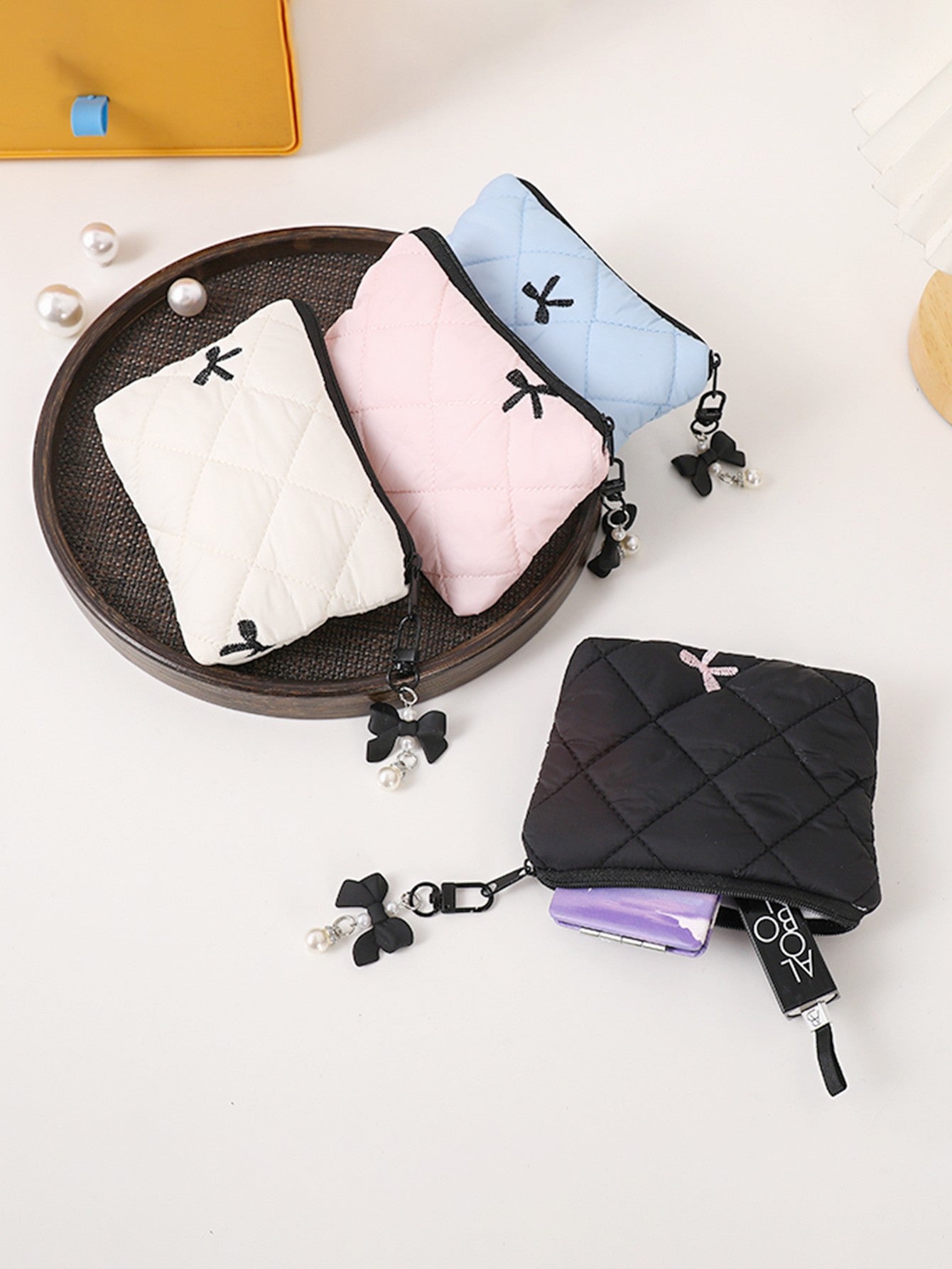 Simple bow quilted clutch, portable everyday small item pouch for lipstick, earphones, and change, soft travel makeup bag