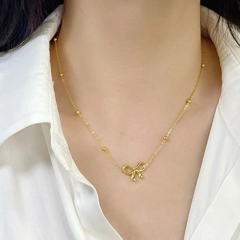 ANENJERY L316 Colar Feminino de Aço Inoxidável com Corrente de Contas e Pingente de Laço Oco Acessório de Joia Simples e Exclusiva