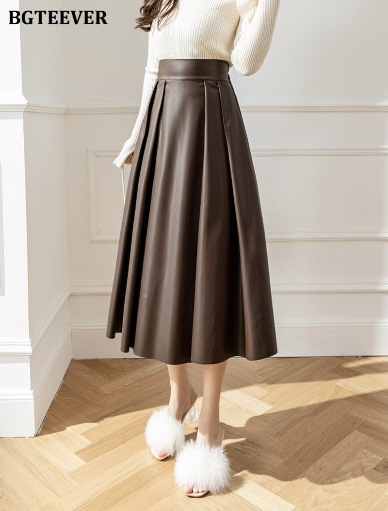 BGTEEVER Spring Autumn Loose PU Leather A-line Skirts Women Elegant High Waist Pleated Faux Leather Skirts Female