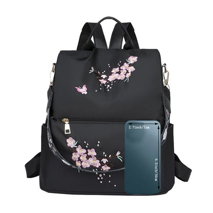 Neutral style backpack for men and women, suitable for daily travel and outings. Features a rear zipper with printed design.